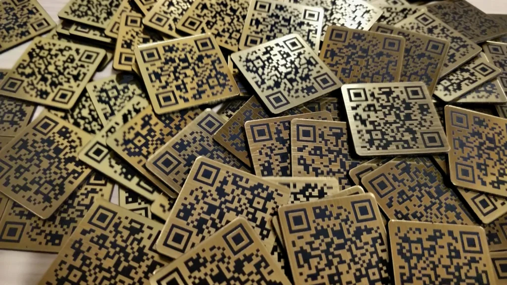 Batch of brass QR identification tags with variable data